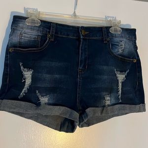 Stretchy cuffed jean shorts with ripped detail